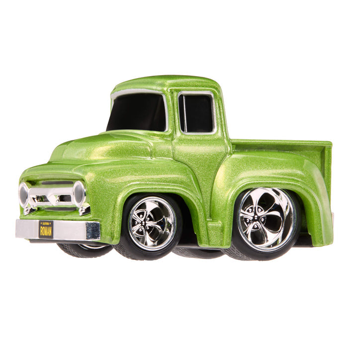 Green truck with silver wheel rims on white background