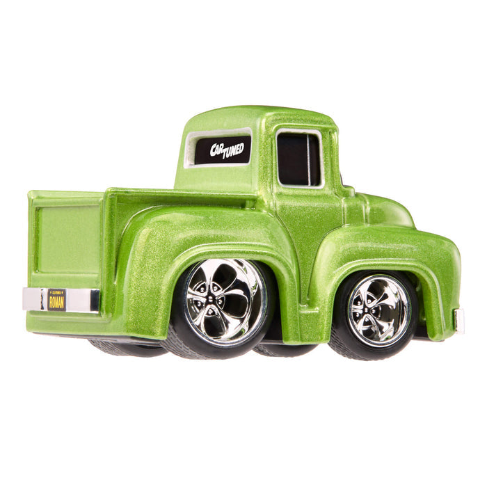 Green truck with silver wheel rims on white background