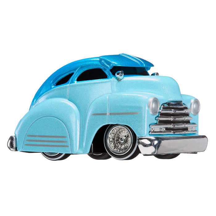 Light blue vintage car model on a white background