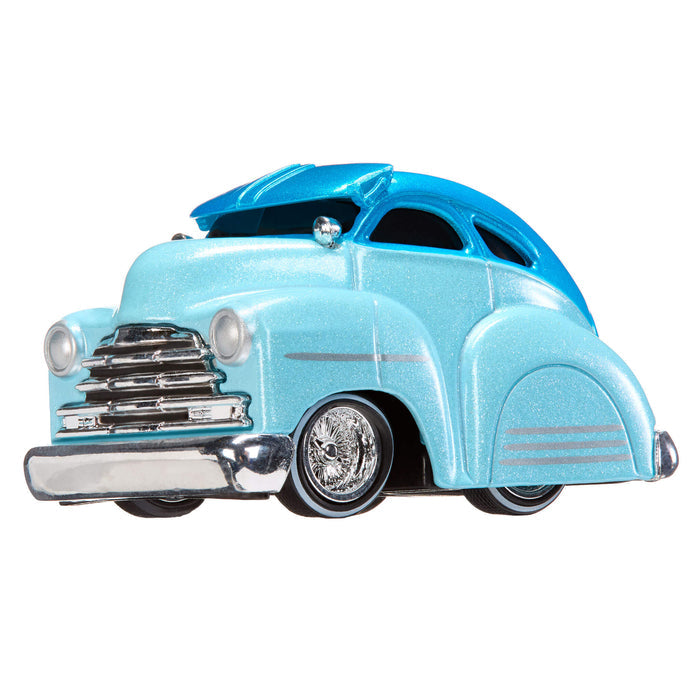 Light blue vintage car model on a white background