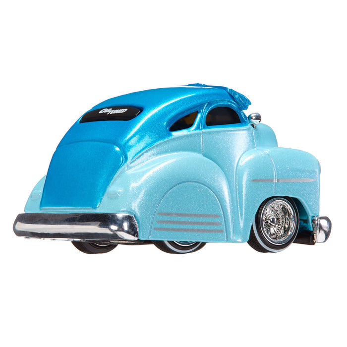 Light blue vintage car model on a white background
