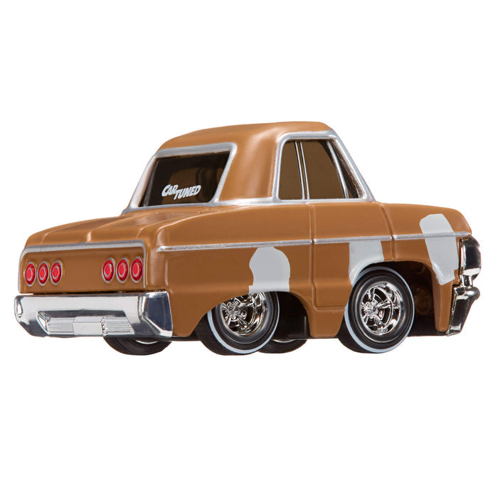 Model car with a brown body with primer patches on a white background