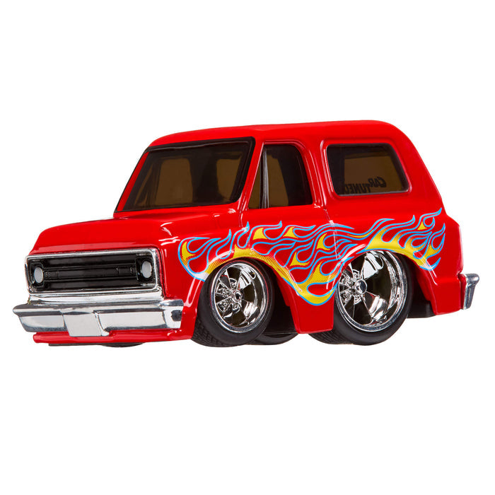 Red model car with flame design on a white background
