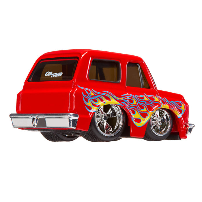 Red toy Blazer with flame design on a white background