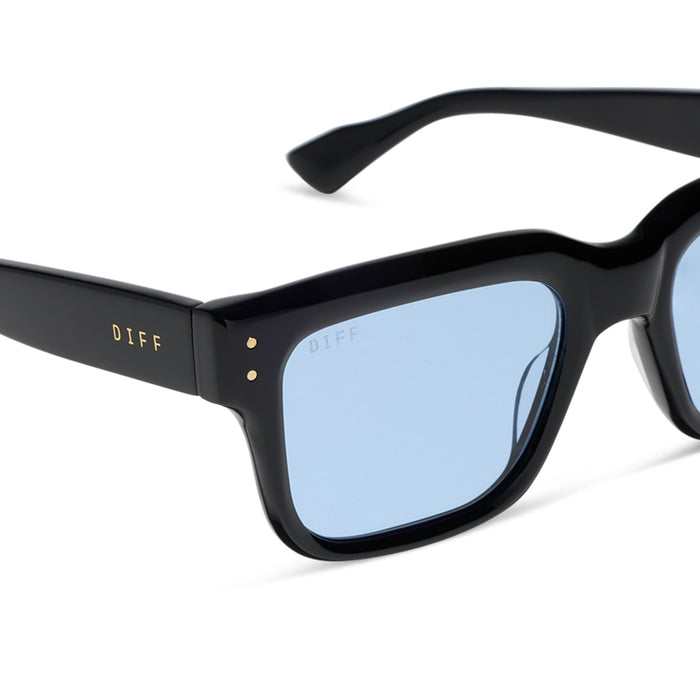 diff eyewear featuring the cash  sunglasses with a black acetate frame and light blue tint lenses detailed view