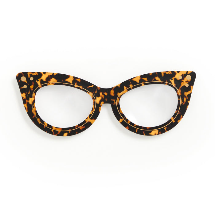 The Galison Cat Eye Readers Bookmark with Magnifier features a chic black and amber tortoiseshell pattern on a white background—ideal as a stylish accessory or unique bookmark.