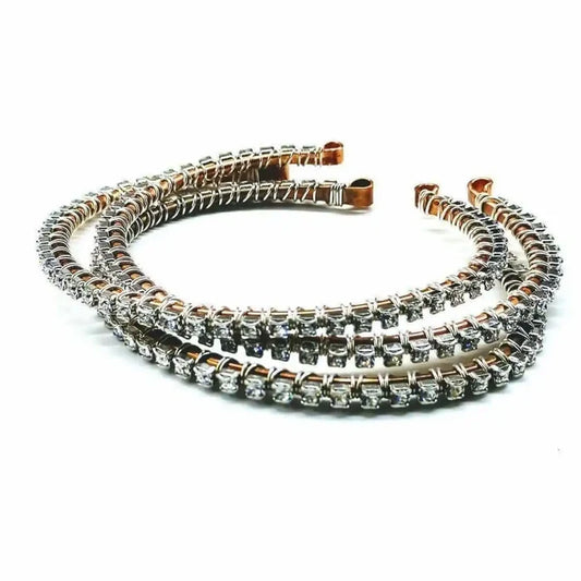 Catch-Free Crystal Rhinestone Tennis Bracelet Bangle with sparkling Swarovski-quality rhinestones on a copper bangle.