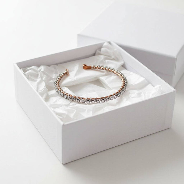 Catch-Free Crystal Rhinestone Tennis Bracelet Bangle presented in an elegant white gift box with tissue.