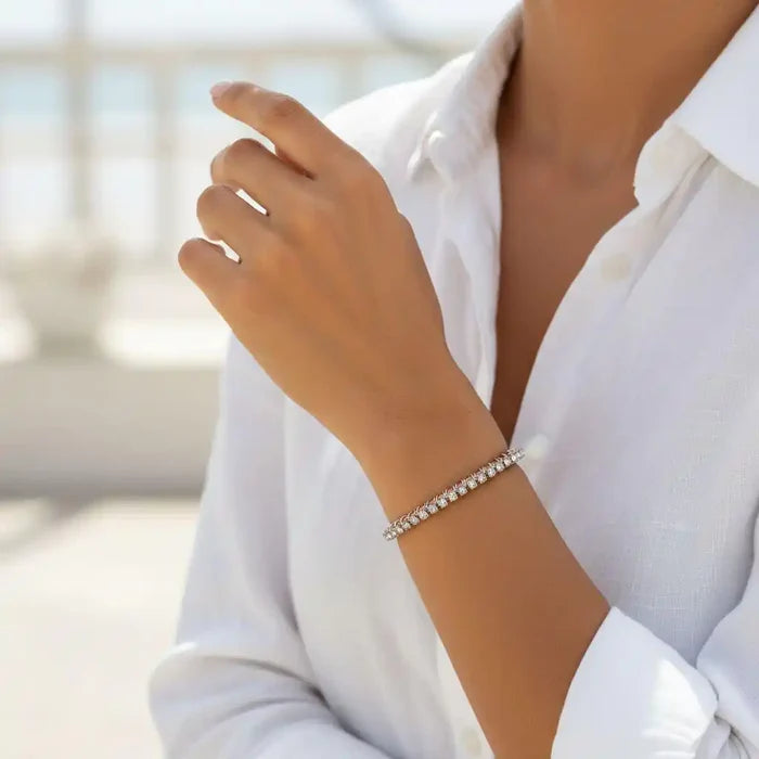 Catch-Free Crystal Rhinestone Tennis Bracelet Bangle worn on a woman's wrist, showcasing its sparkling design.