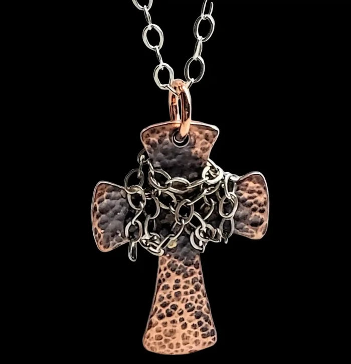 Chained Hammered Copper Cross Necklace For Him Or Her on a chain, showcasing unique handcrafted metalwork details.