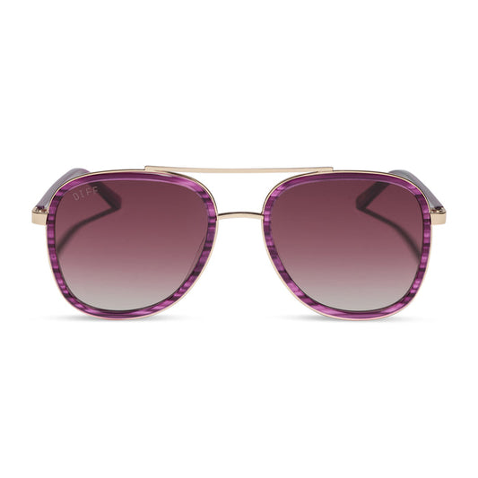 diff eyewear x disney alice in wonderland cheshire cate oversized navigator sunglasses with a purple frame and pink gradient lenses front view