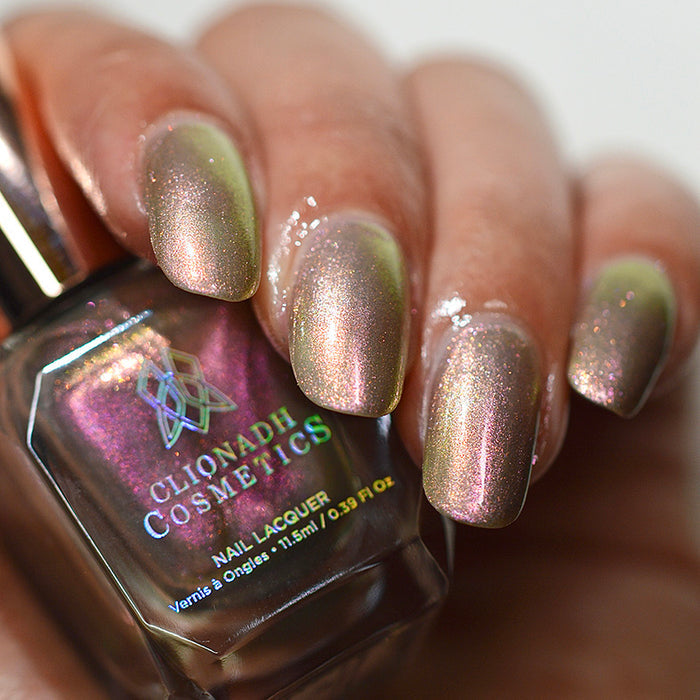 Close up of nails done with Cobblestone nail lacquer on medium skin tone