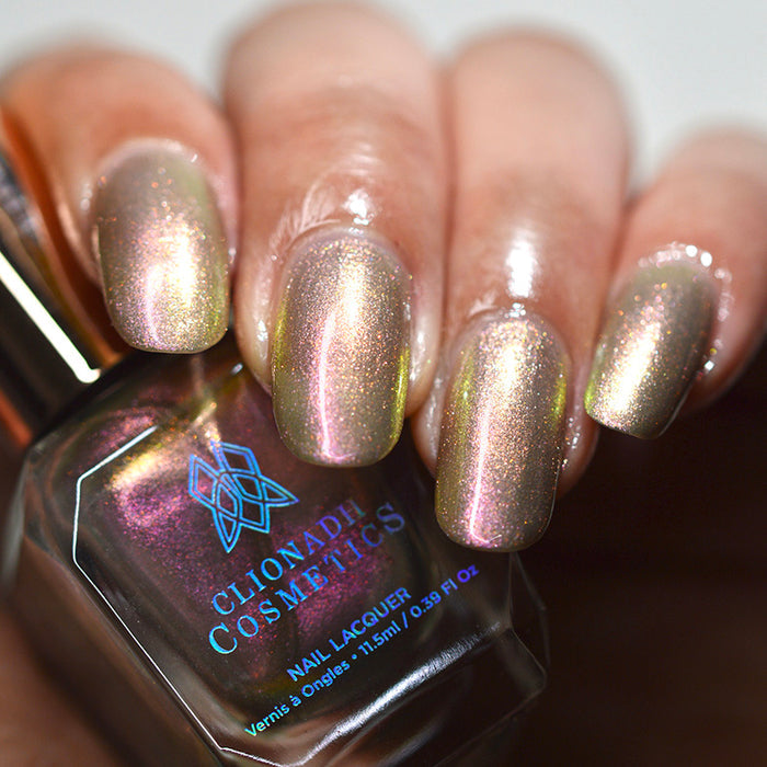 Close up of nails done with Cobblestone nail lacquer on medium skin tone