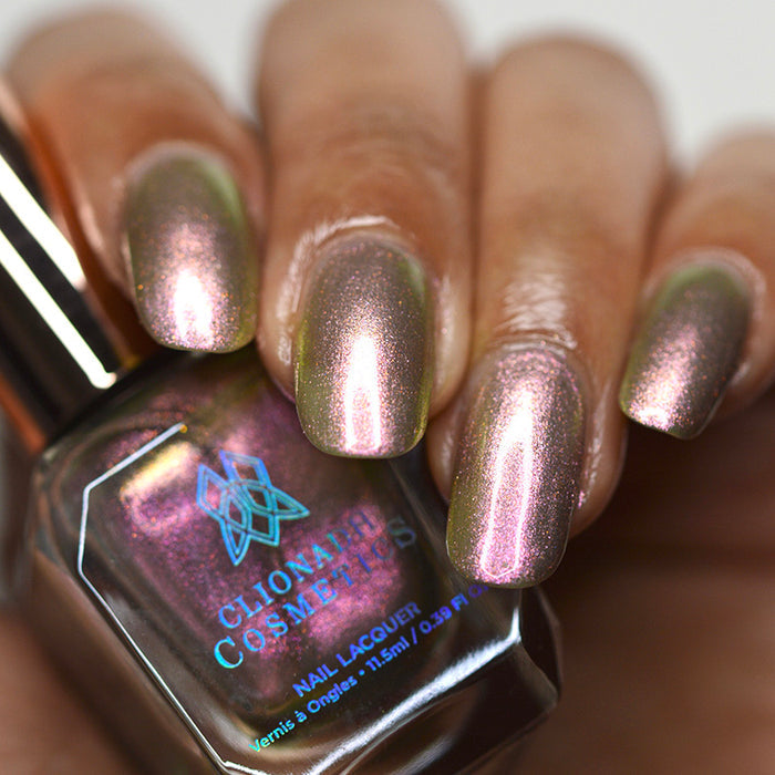 Close up of nails done with Cobblestone nail lacquer on deep skin tone.