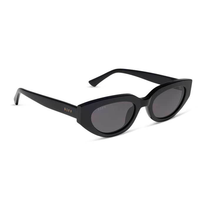 diff eyewear x jessie james decker crystal cat eye sunglasses with a black acetate frame and grey polarized lenses angled view