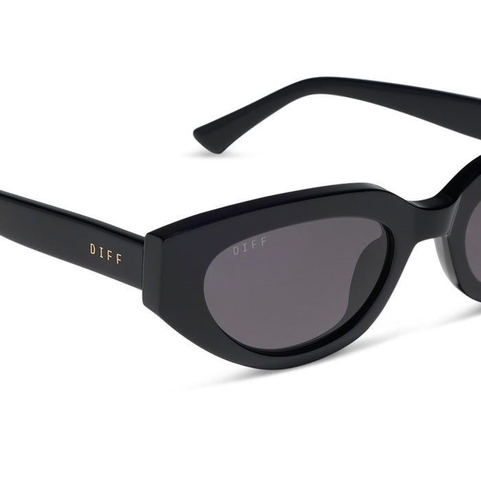 diff eyewear x jessie james decker crystal cat eye sunglasses with a black acetate frame and grey polarized lenses detailed view