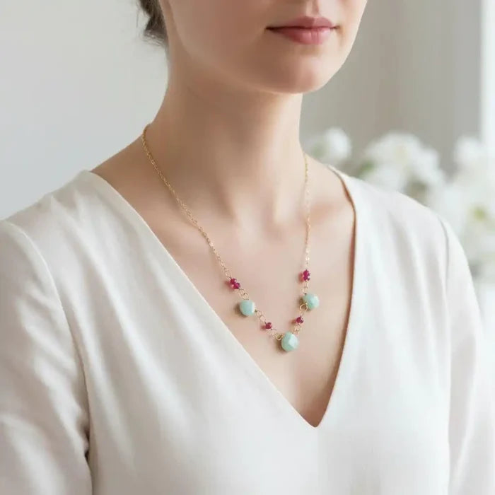 Dainty Gold Chain Mint and Hot Pink Gemstone Necklace worn by a model, showcasing vibrant pink chalcedony and mint amazonite.