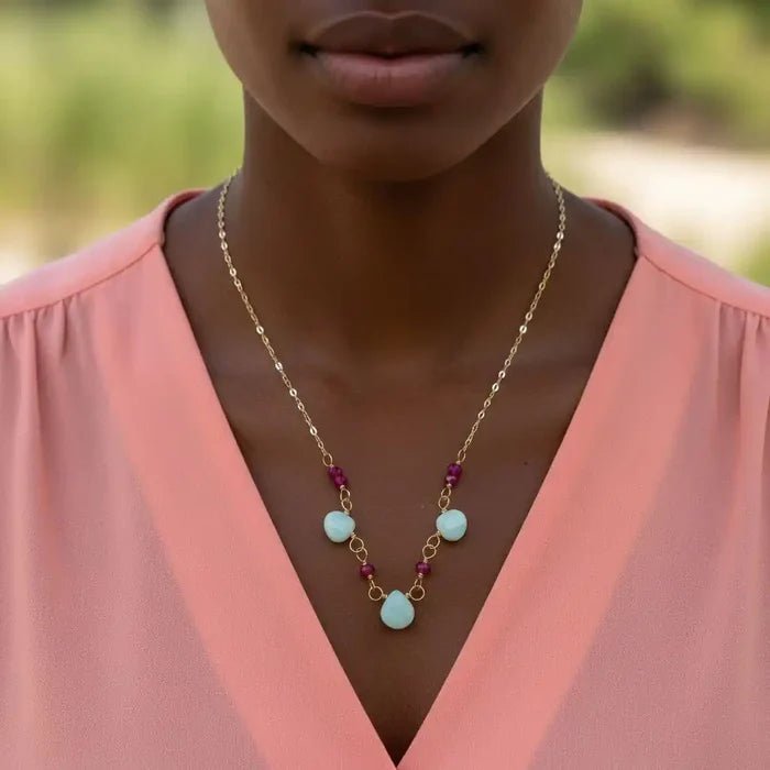 Dainty Gold Chain Mint and Hot Pink Gemstone Necklace worn by a model showcasing its elegant design.