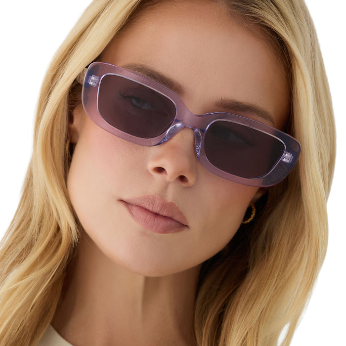 on model - female wearing diff eyewear daphne ii low profile square sunglasses with a lilac crystal purple acetate frame and grey lenses front view