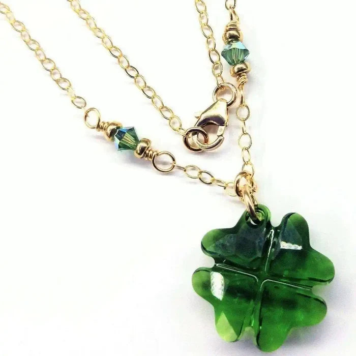 Dark Green Sparkly Crystal Lucky Clover Necklace featuring a green clover pendant and gold chain.