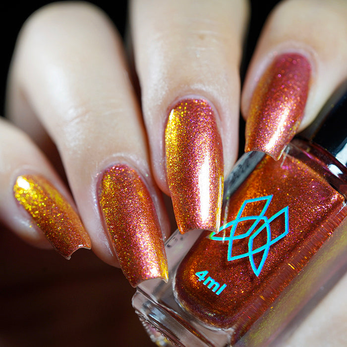 Close up shot of nails done with Ring of Fire on fair skin tone