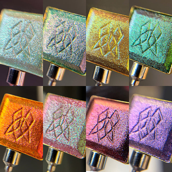 Collage of all eight eyeshadows included in the Deep Sea Treasures Palette in single pans.