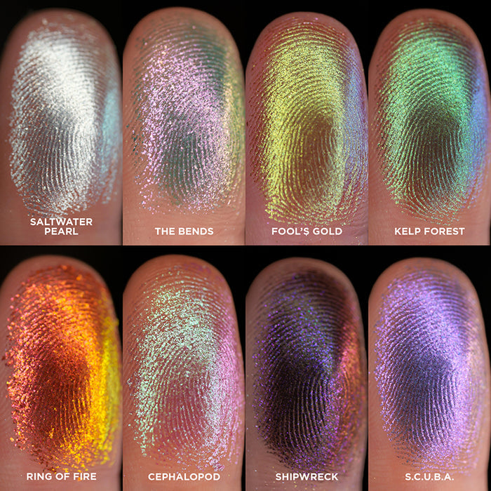 Close-up finger swatches of all eight eyeshadows included in the Deep Sea Treasures Palette.