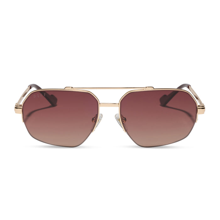 diff eyewear x jessie james decker destiny navigator sunglasses with a gold metal frame and dusk gradient lenses front view