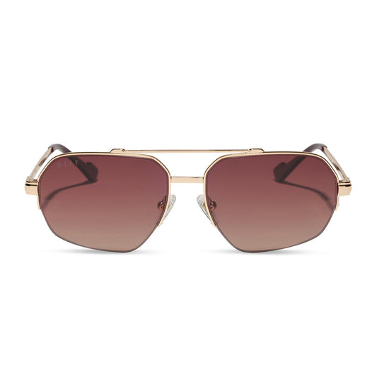 diff eyewear x jessie james decker destiny navigator sunglasses with a gold metal frame and dusk gradient lenses front view