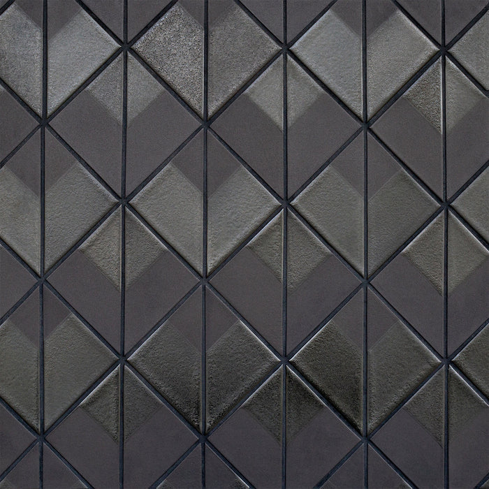 Caption: Dual Glaze 4" Triangles in DG12 Basalt Lava Blend. Charcoal grout by Custom Building Products.