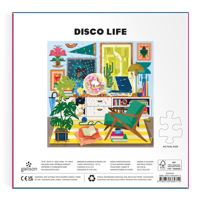 Illustration from the Disco Life 500 Piece Foil Puzzle by EurekartStudio showcases a vibrant room with plants, a green chair, desk with books and lamp, wall art, and a sparkling disco ball for retro charm and modern elegance.