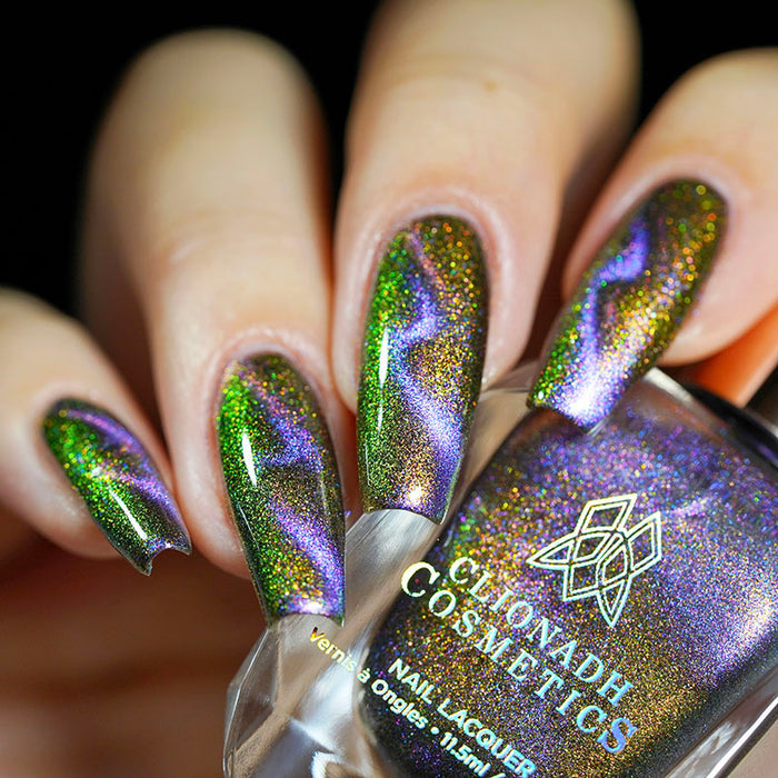Close up of nails done with Distortion featuring a zig zag magnetic effect on fair skin tone