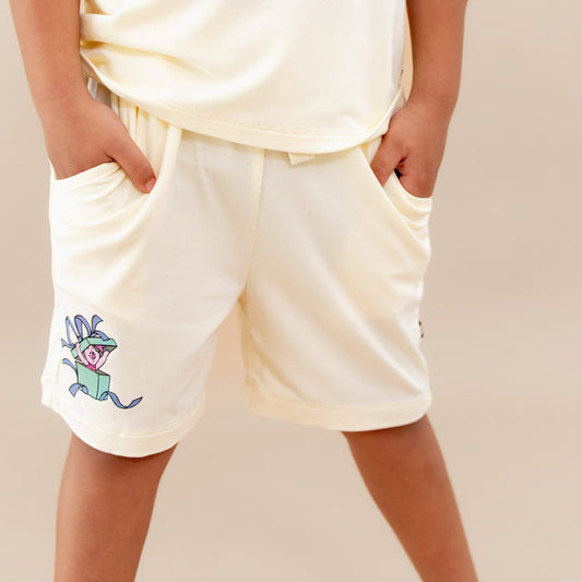 The Drawstring Short in Winnie the Pooh on Chamomile shown on a model