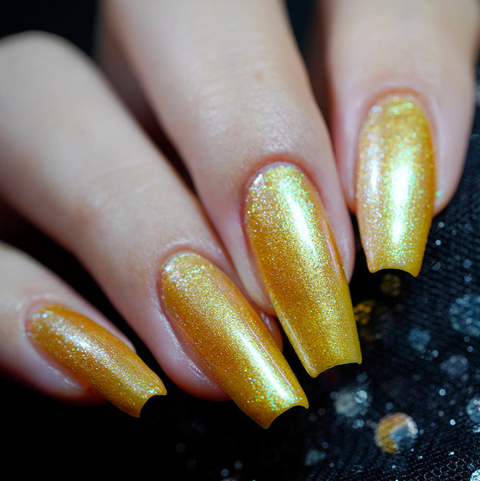 Close up shot of nails done with Embellishment nail lacquer on fair skin tone