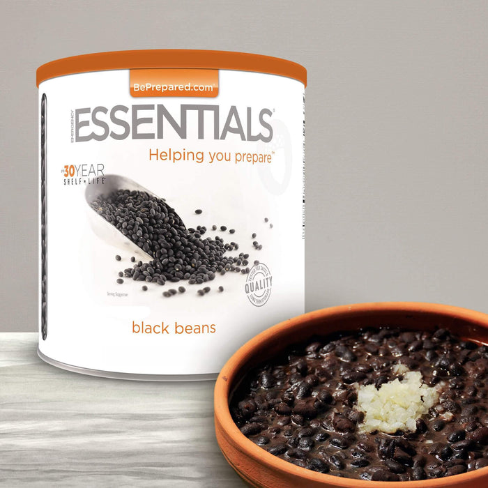 Emergency Essentials Black Beans #10 can with scoop of dried black beans, up to 30-year shelf life.