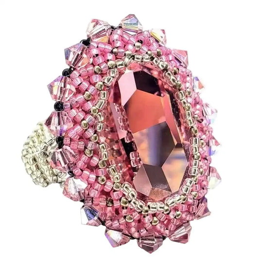 Epic Beaded Rose Crystal Bling Cocktail Ring featuring intricate pink beadwork and a large crystal centerpiece.