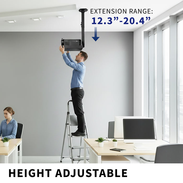 Person using a height-adjustable extension projector tray in an office setting.