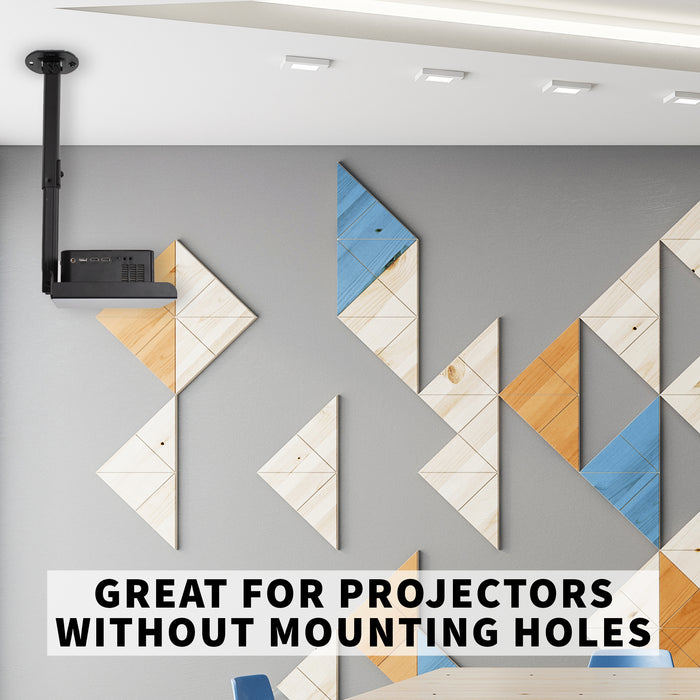 Projector on a ceiling  mounted projector tray with geometric wall art in the background