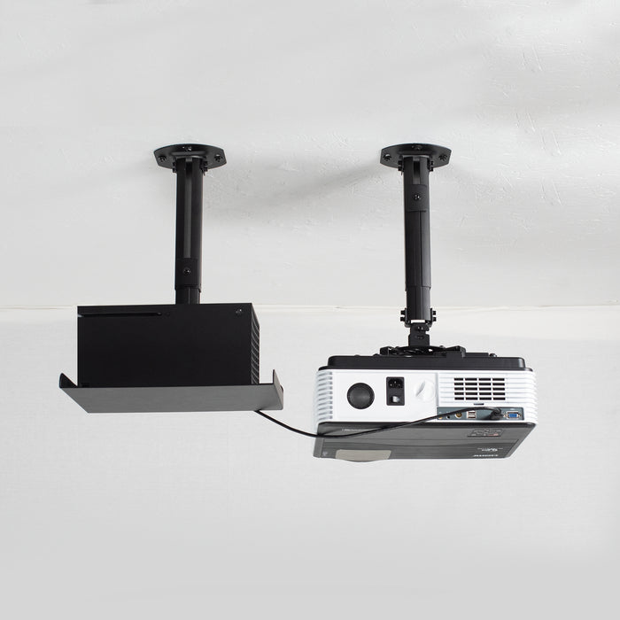 Projector on a ceiling mount next to a speaker shown on ceiling mount with cord connected to the projector