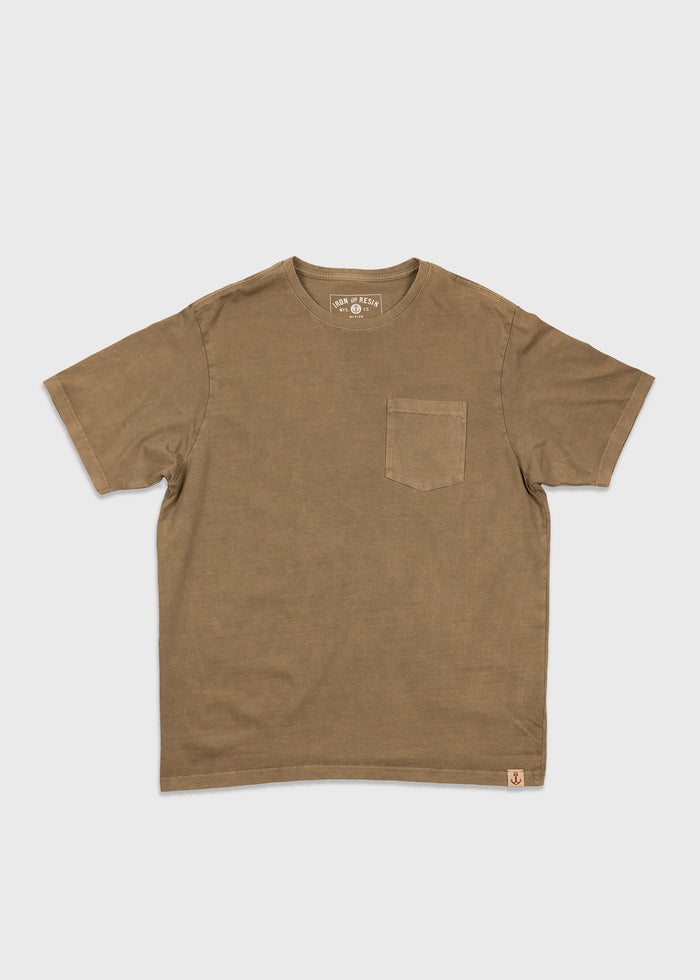 Brown T-shirt with a chest pocket on a white background. Simple design, short sleeves, crew neck, and small logo tag at the hem.