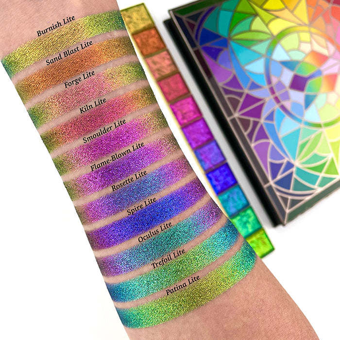 Arm swatches of Flame-Blown Lite as well as the other Jewelled Lites on fair skin tone.