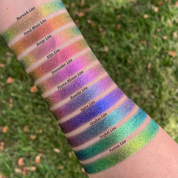 Arm swatches taken outside of Flame-Blown Lite as well as the other Jewelled Lites on fair skin tone.