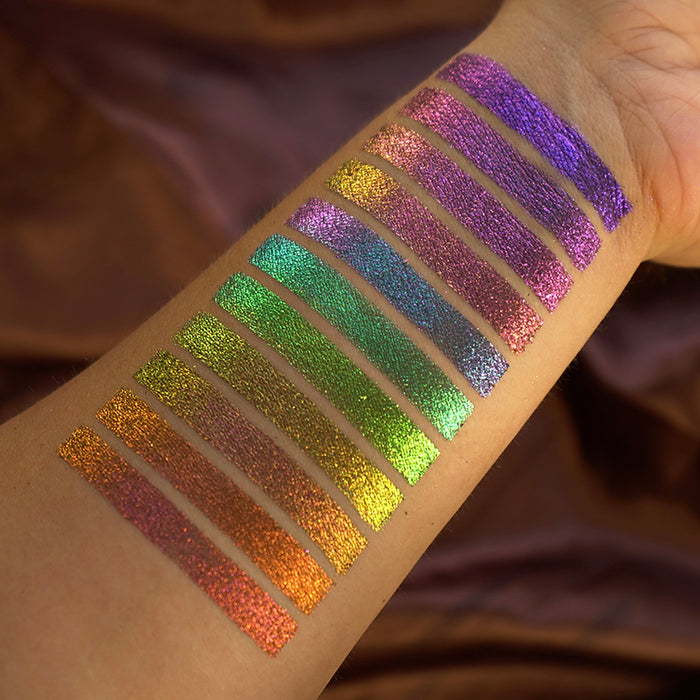 Arm swatches of Forge Lite as well as the other Jewelled Lites on fair skin tone.