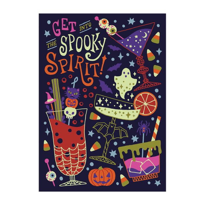 The Get into the Spooky Spirit Greeting Card Puzzle by Camille Chew features a vibrant Halloween design with cocktails, candy corn, bats, skulls, pumpkins, eyeballs, stars, and festive decorations around the cheerful message.