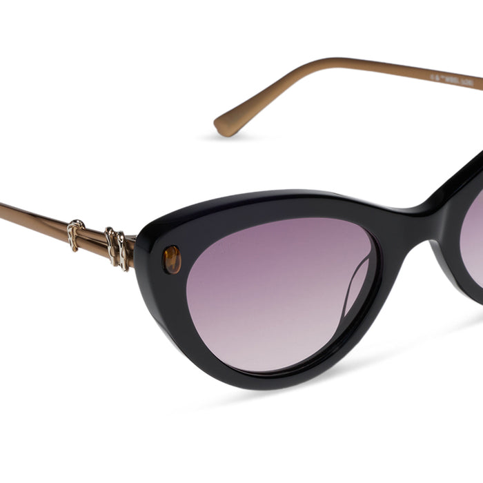 diff eyewear x practical magic 2 featuring the gillian cateye sunglasses with a black frame and purple gradient lenses detailed view