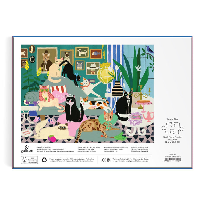 The back of the Anne Bentley Glamour Cats 1000 Piece Puzzle box features a colorful illustration of glamorous cats lounging and playing in a vibrant room filled with cat trees, plants, toys, and cozy spots.