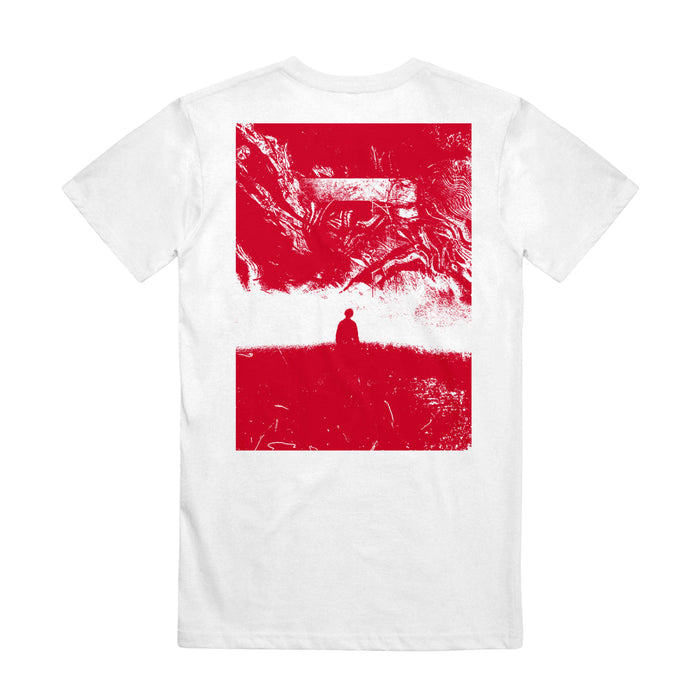 Back of shirt has picture of person's silhouette and swirls and shapes are above and below them. The picture is in white and red and covers most of the back of the shirt.