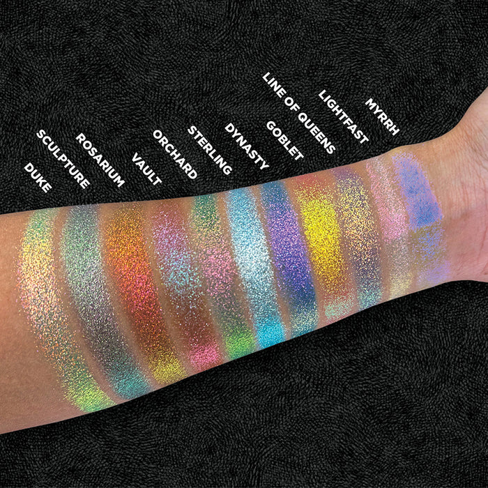 Top angled arm swatches of Goblet and the rest of the Holiday Expansion Bundle shades on medium skin tone.