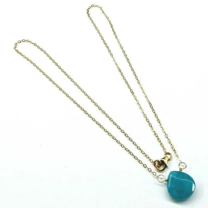 Gold Filled Aqua Jade Wire Wrap Gemstone Drop Necklace showcasing a beautiful aqua jade briolette on a gold chain.