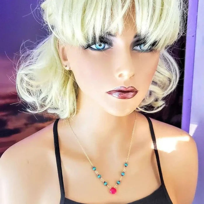 Gold Filled Pink Chalcedony Turquoise Gemstone Drop Necklace showcased on a mannequin with blonde hair and blue eyes.